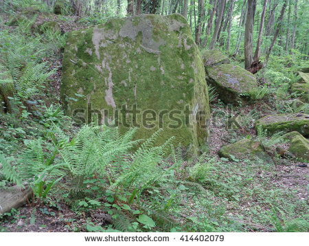 ancient stone pyramid in caucasian forest